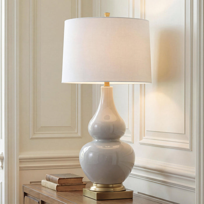 Weswick - Ceramic Table Lamp - Cream / Gold Finish